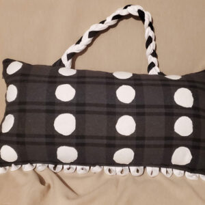 The polka dot handle pillow