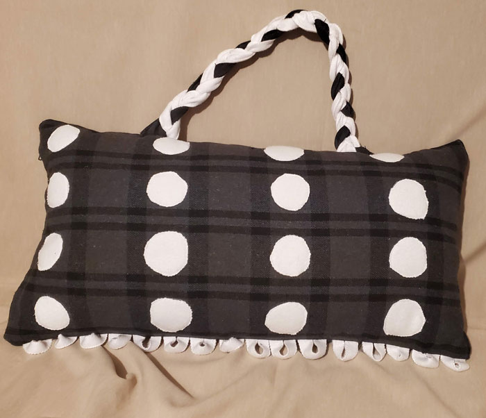 The polka dot handle pillow