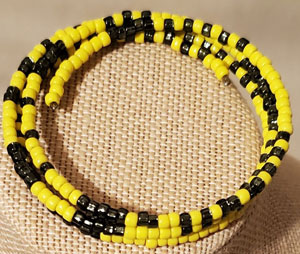 Yellow gunmetal wire wrap bracelet